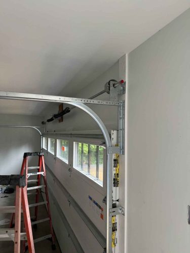 In-progress garage door track repair