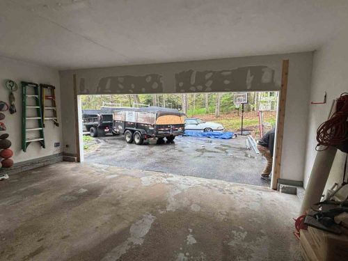 In-progress new garage door installation by Suppa  Sons Overhead Doors