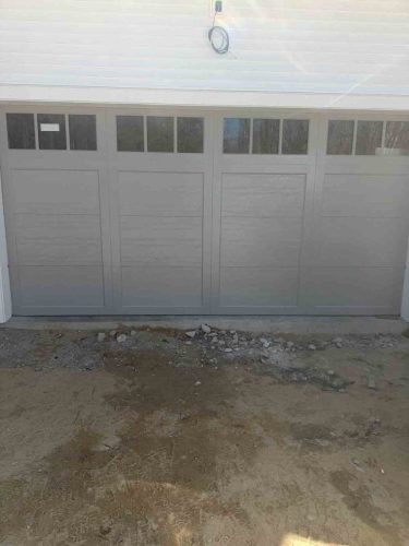 In-progress new garage door installation by Suppa  Sons Overhead Doors