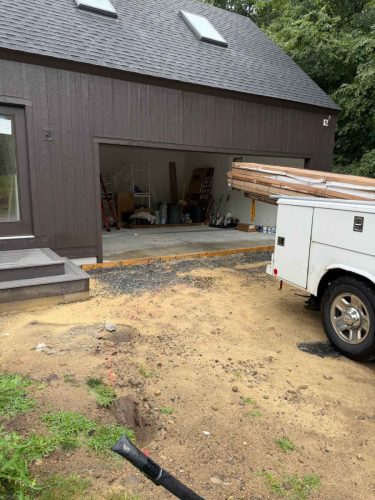 In-progress garage door installation