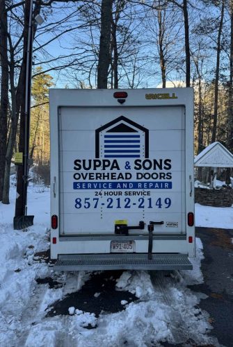 Truck with the Suppa  Sons Overhead Doors logo